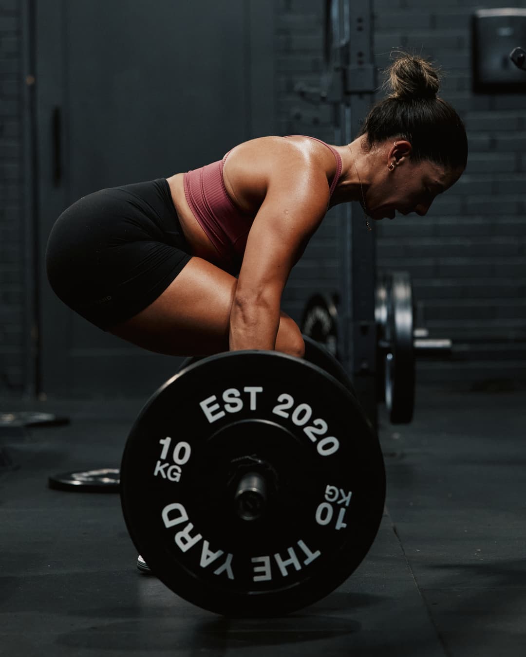Coach and franchisee performing deadlifts during a lower body strength session on the rig at The Yard Gym.
