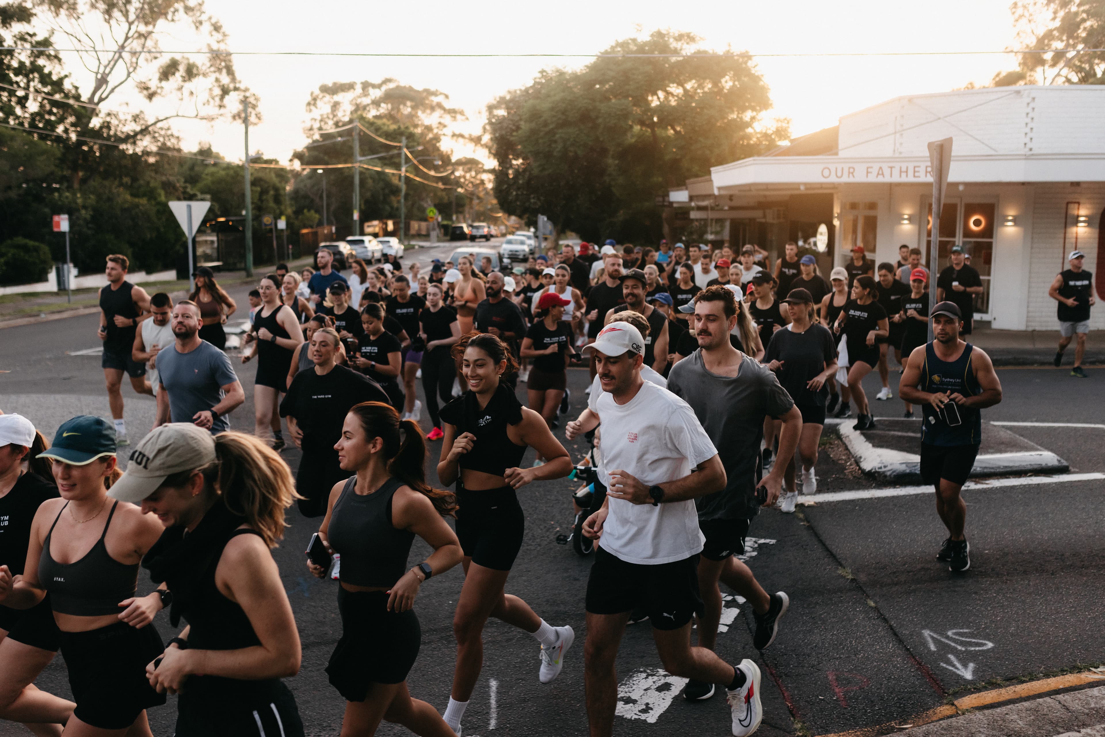 The Yard Gym members from Shire gyms Menai, Kirrawee, Heathcote, and Caringbah gathering for a community charity Run Club, starting from Our Father Café in Caringbah.