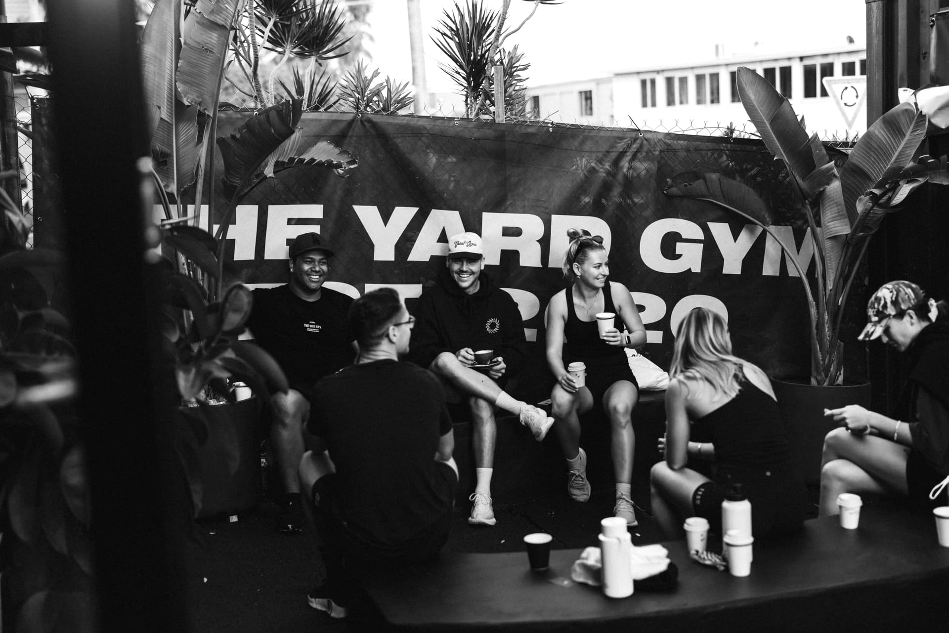 Community members chatting and connecting after a hybrid training Saturday session at The Yard Gym Caringbah, located in the Shire.